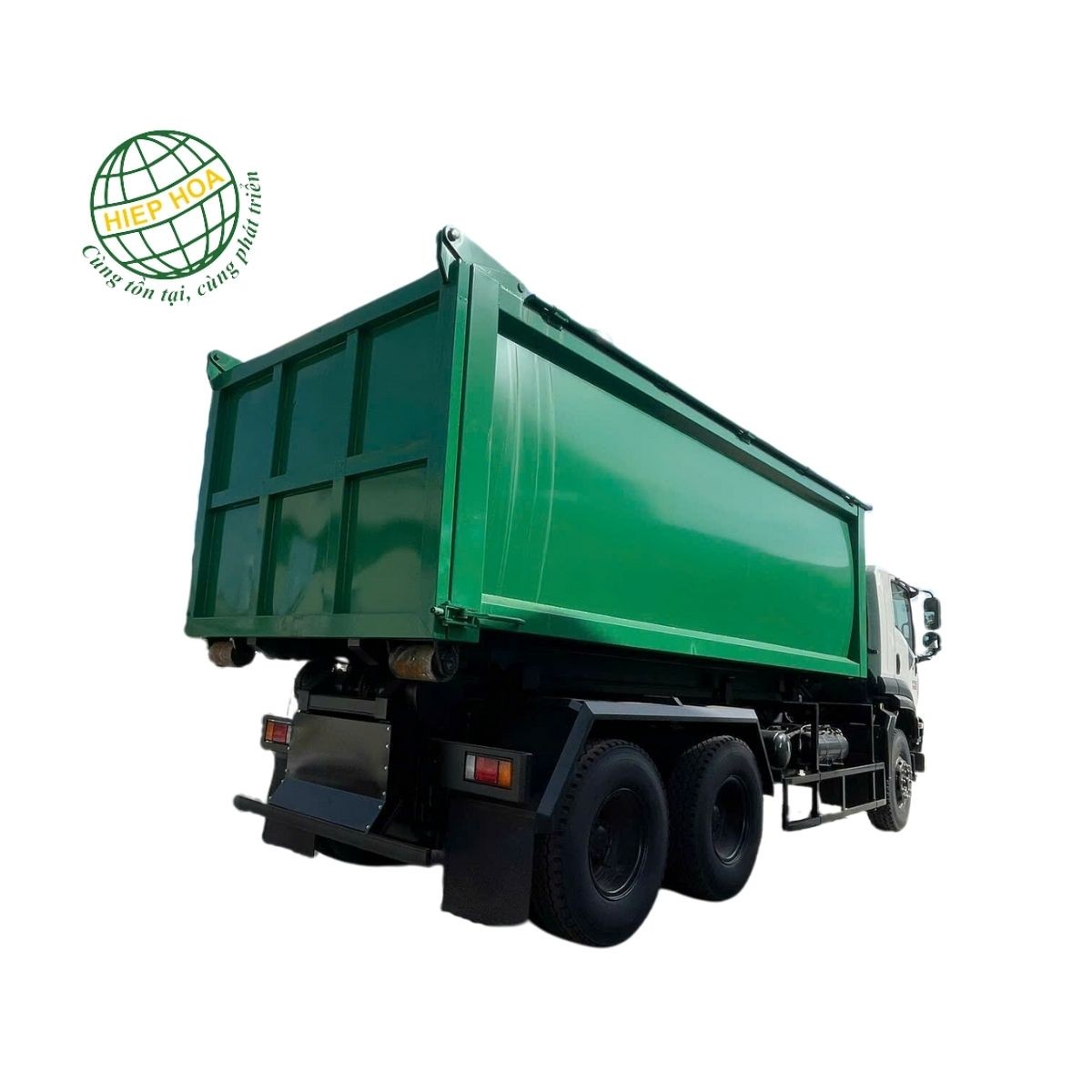 Xe ô tô chở rác chuyên dùng với thùng rời đang được đặt xuống