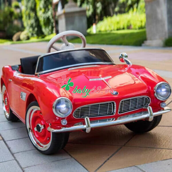 Góc nhìn phía sau xe điện trẻ em BMW 507 màu đỏ