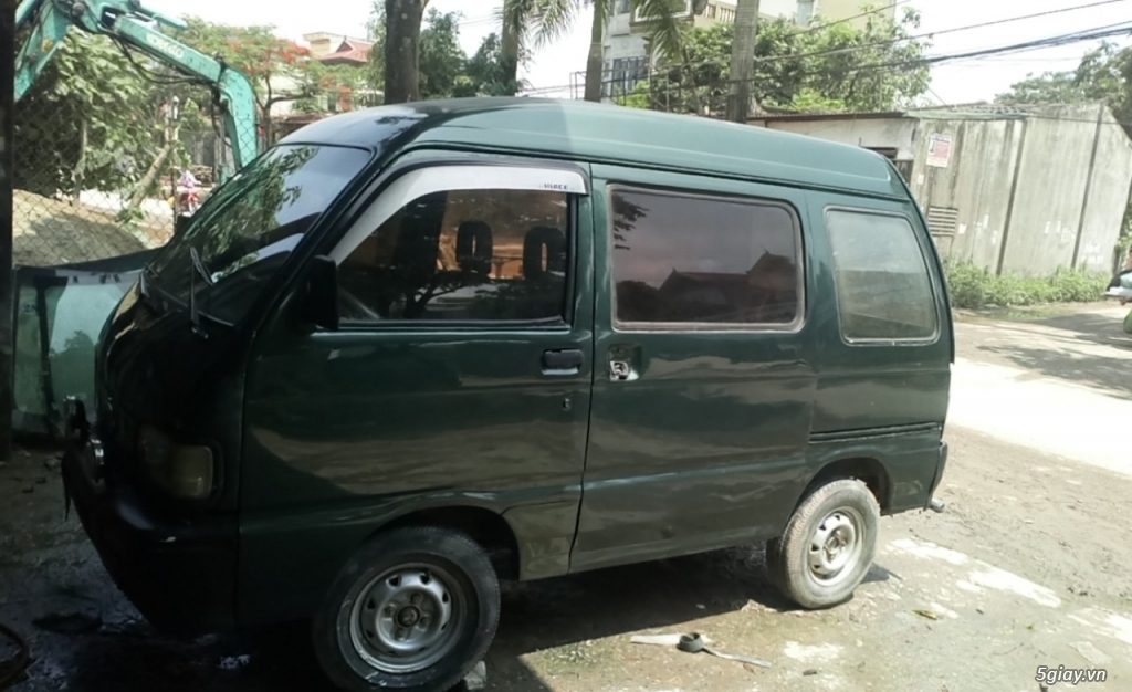 Đồng hồ taplo và vô lăng của ô tô Asia 7 chỗ
