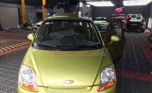 Ảnh chụp ngoại thất xe ô tô Chevrolet Spark VAN 2014 màu xanh đang rao bán tại Tp.HCM