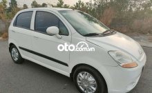Ảnh chụp ngoại thất xe ô tô Chevrolet Spark VAN 2014 màu trắng đang rao bán tại Bình Dương