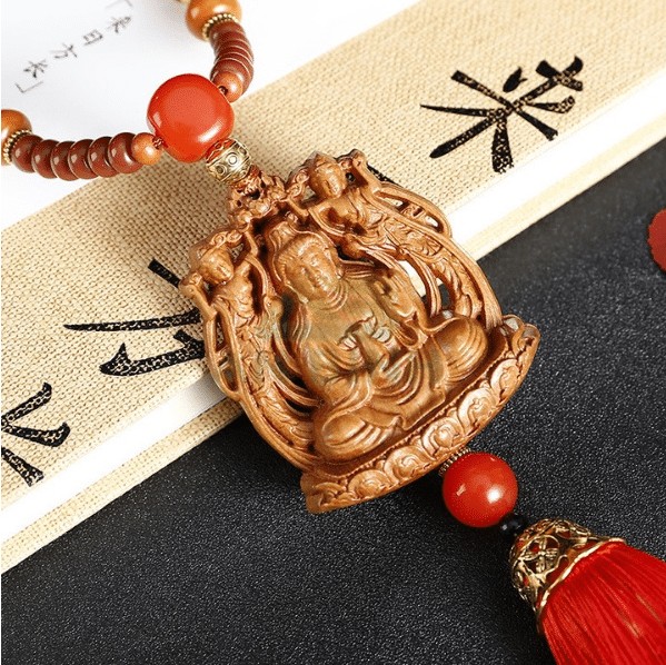 Tượng gỗ treo xe ô tô: Biểu tượng bình an trên mọi nẻo đường