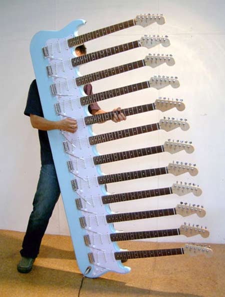 Cây đàn guitar 12 cần phức tạp, tượng trưng cho kỹ thuật chế tạo xe ô tô tự chế năng lượng mặt trời